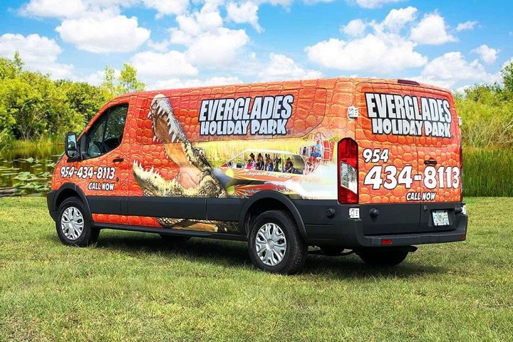 Colorful van with an Everglades Holiday Park ad, featuring a large alligator.